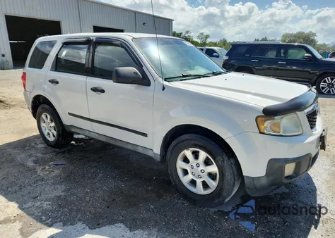 2011 Mazda Tribute I из США, поврежденный, VIN 4F2CY0C78BKM07277